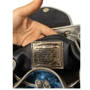 Coach | Bags | Coach Poppy Sequin Backpack Blue Metallic Bag  display picture 1
